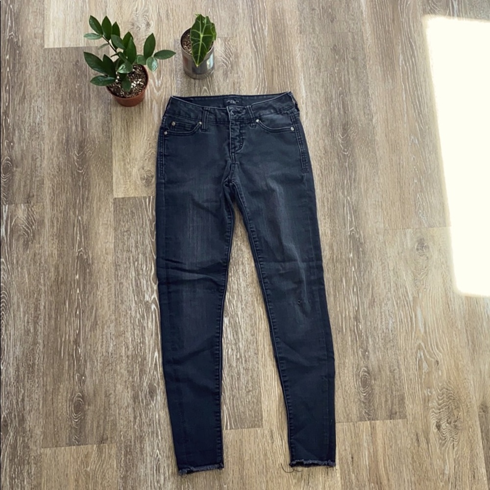 Celebrity pink black skinny jeans